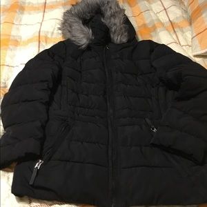- Woman’s Calvin Klein puffer